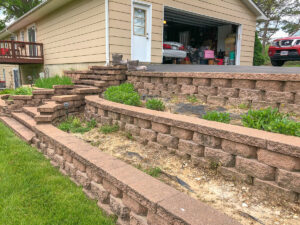 Retaining Wall and Drain Repair - Greener Designs Landscaping--Lawn-&--Construction