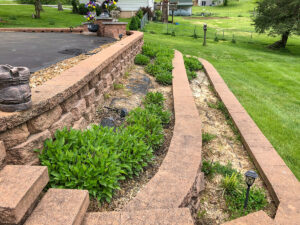 Retaining Wall and Drain Repair - Greener Designs Landscaping--Lawn-&--Construction