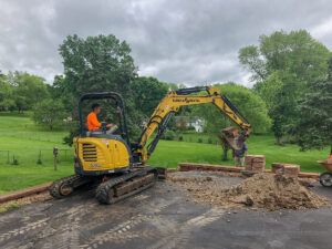 Retaining Wall and Drain Repair - Greener Designs Landscaping--Lawn-&--Construction