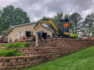Retaining Wall and Drain Repair - Greener Designs Landscaping--Lawn-&--Construction