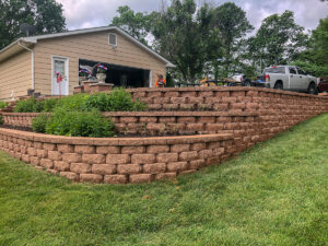 Retaining Wall and Drain Repair - Greener Designs Landscaping--Lawn-&--Construction