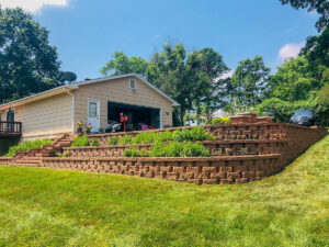 Retaining Wall and Drain Repair - Greener Designs Landscaping--Lawn-&--Construction
